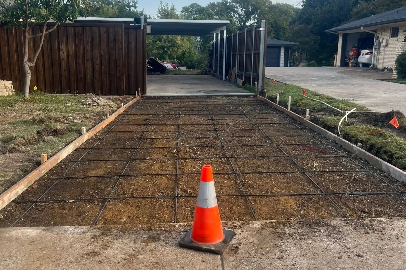 Driveway formed with rebar and base prepped before the concrete pour